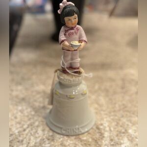 Porcelain Figurine Bell with Child Design